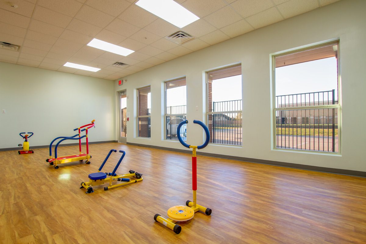 Meadow Montessori School physical activities and toys in a hardwood room