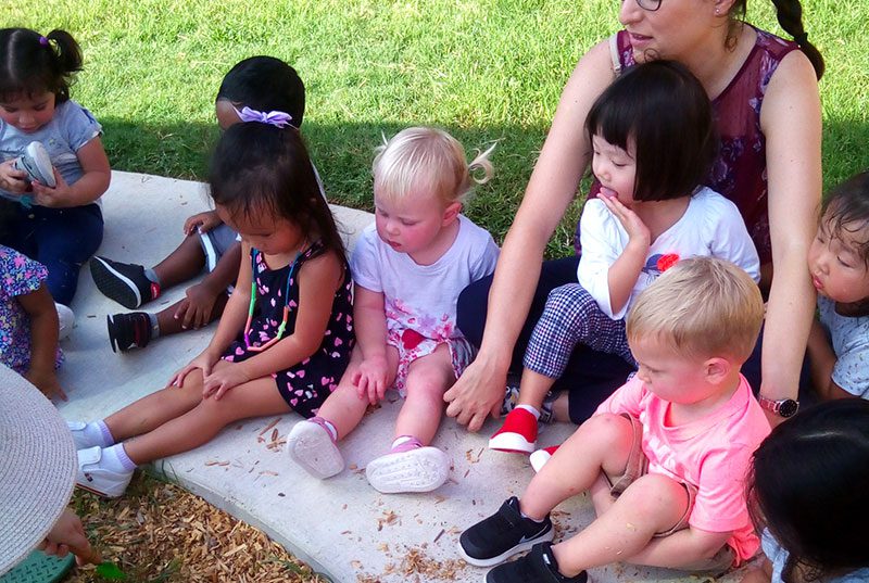 Students at Meadow Montessori School outside in South Richmond, TX