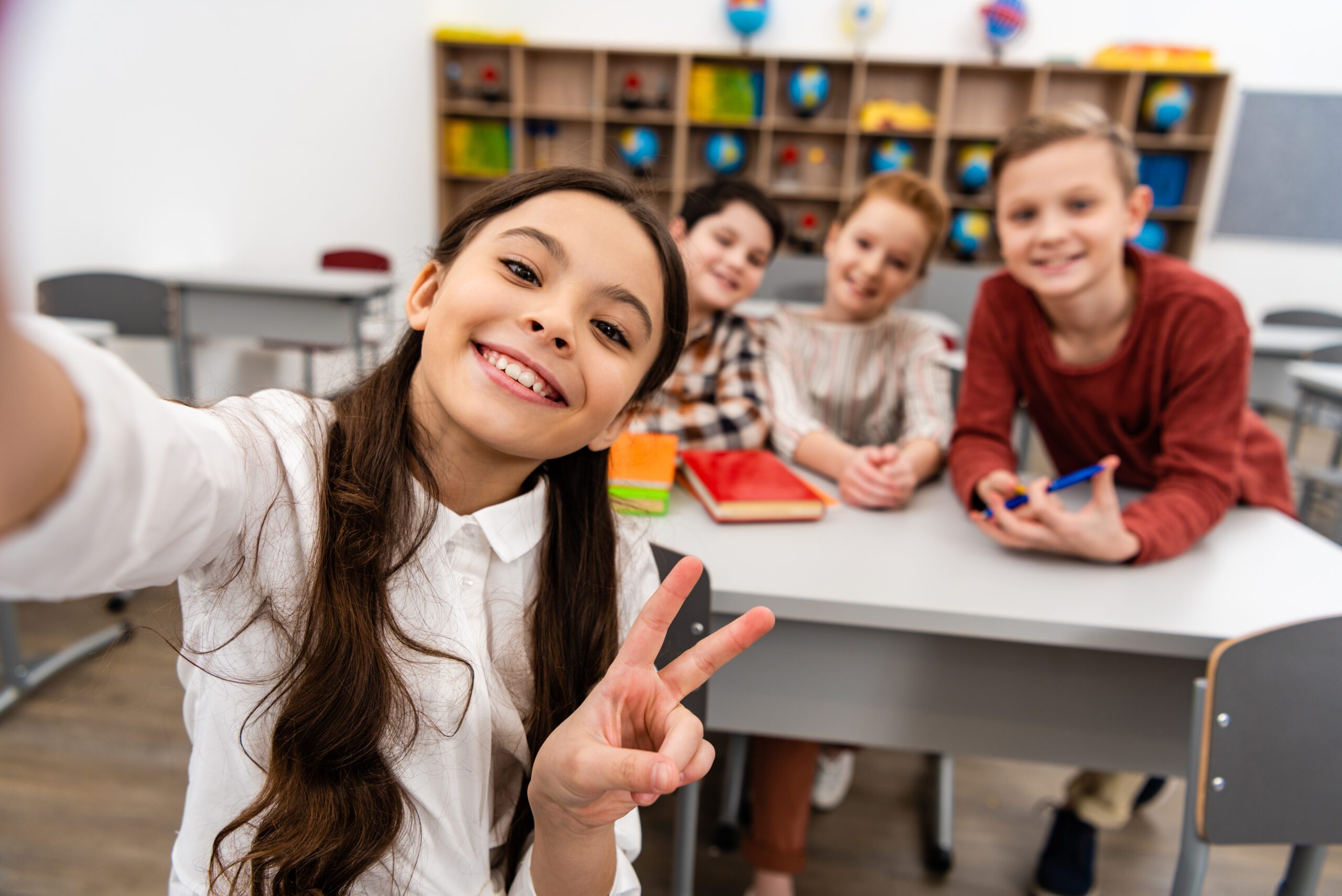 students showing peace in the classroom