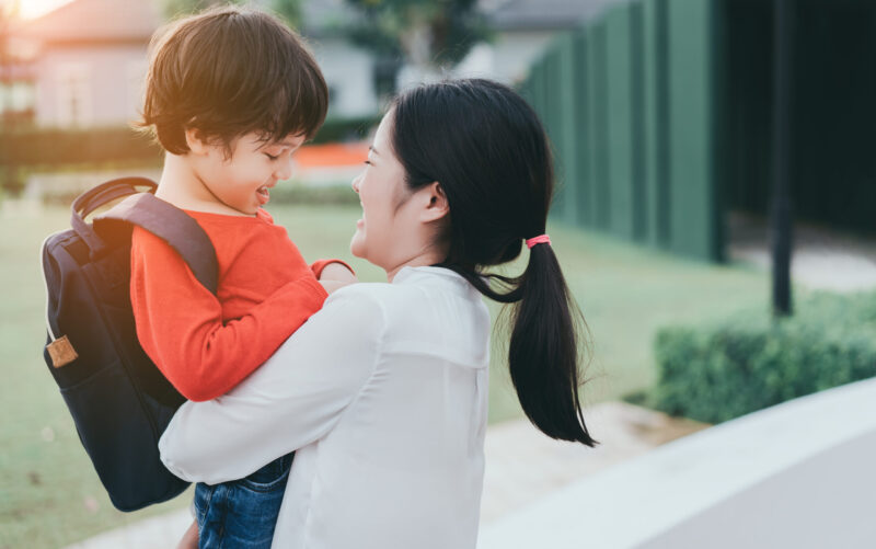 Mother and son hugging before the school day starts